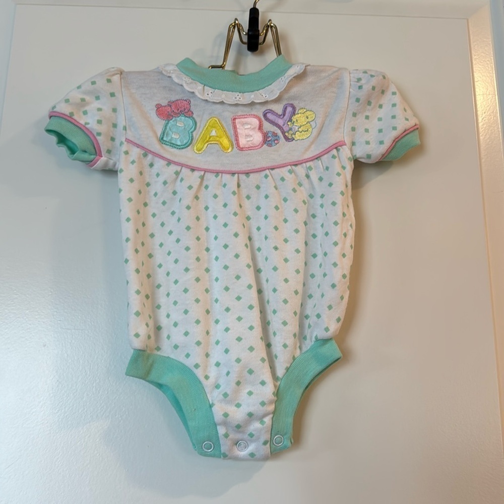 baby onesie w/ word BABY on front w/ pastel colors teal polka dot 6/9 months